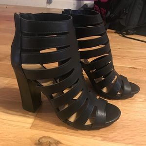 Black open toe caged heel booties